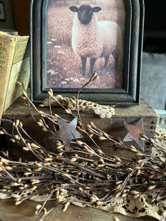 tea stained garland with rusty stars